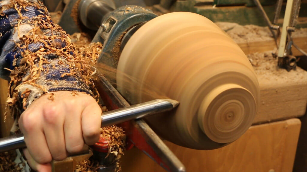 turning a green burl wooden bowl