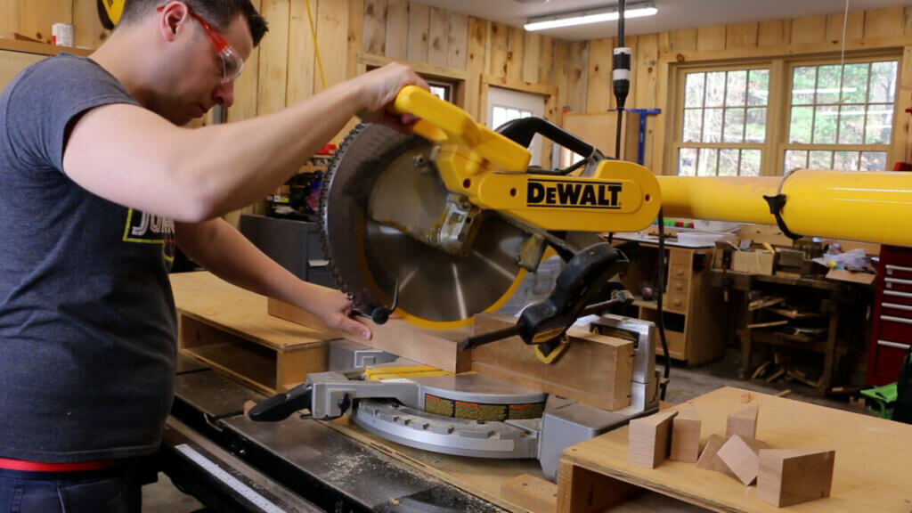 Cutting the 22.5 degree miters of the cross supports for the live edge coffee table.