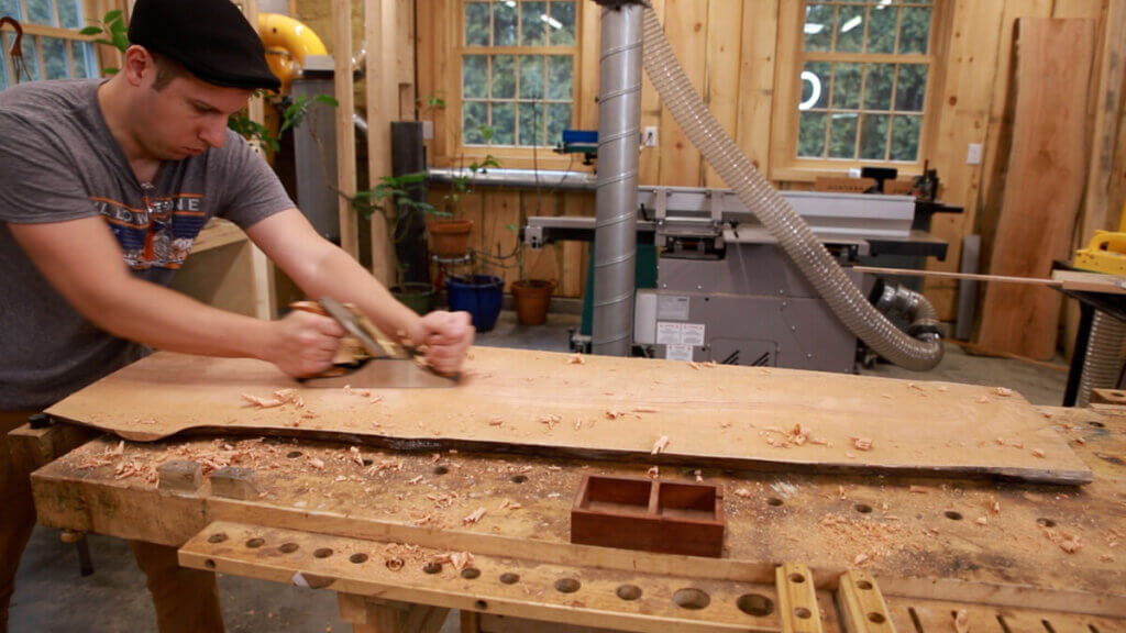 Flattening the slab with hand planes