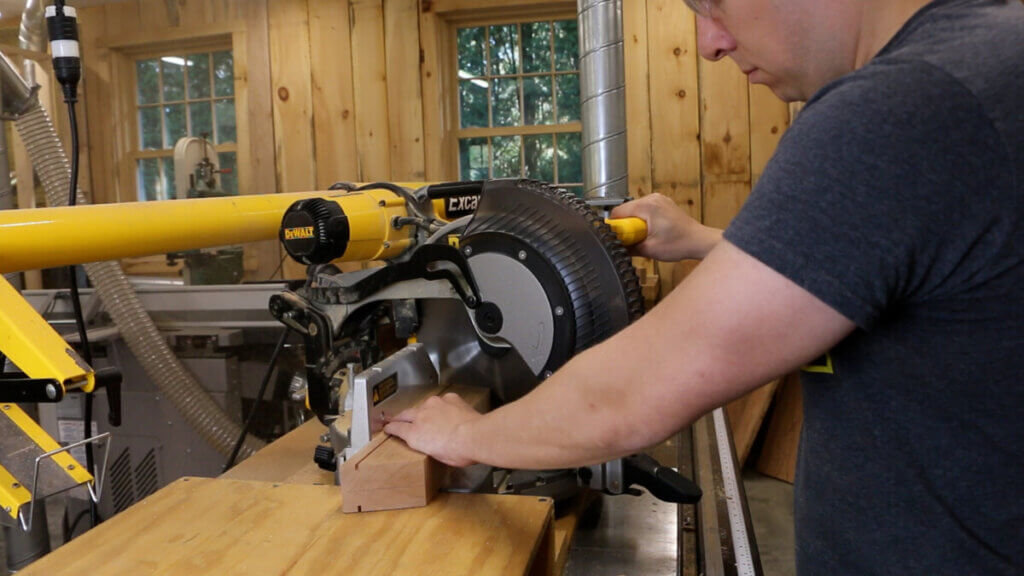 Cutting the 22.5 degree miters of the cross supports for the live edge coffee table 2.